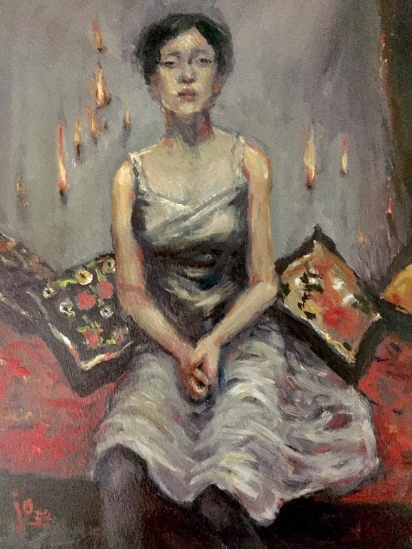 Painting of an Asian woman short dark hair, wearing a grey party dress, hands in lap, seated on a bench with red Persian rug and Chinese pillows. Behind is a grey drop cloth, which has caught on fire in places. 